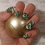 Green peppermint twist Holiday nail art 