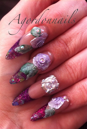 Stiletto nails with 3d flowers and bling