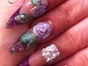 Stiletto nails with 3d flowers and bling