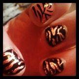 gold foil tiger print nail art