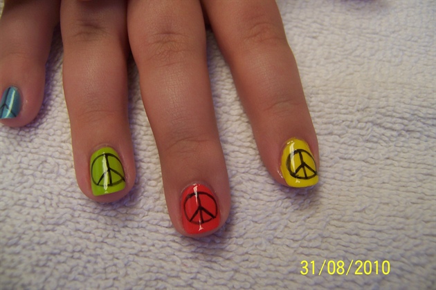 peace signs on multicolored nails