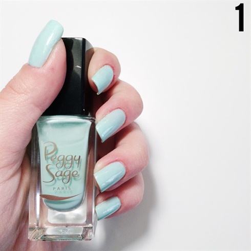 Apply a light blue polish on your nails.