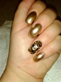 gold nails with leopard print