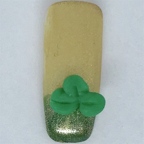 then add creases to petals of the shamrock.