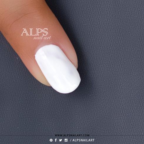 Apply White nail polish on nails.