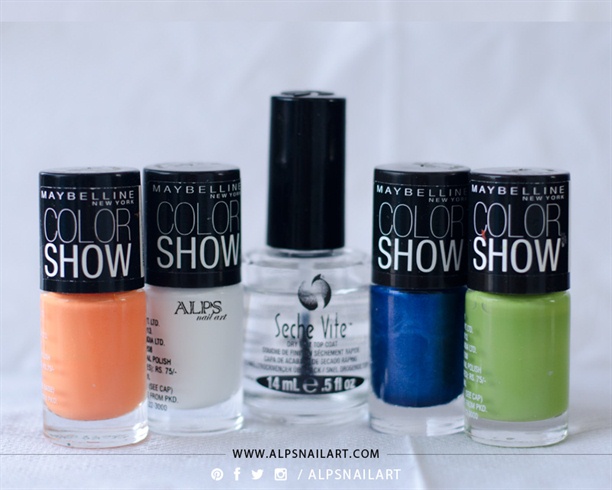 Products Used: Nail polish colors of your choice, Top coat, Needle, Tweezer. 