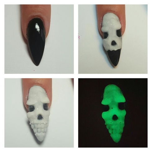 First I did two coats of black gel polish.  Then taking a glow in the dark white acrylic created my 3d skull.  Details done using a size 2 acrylic brush and silicone tools. 