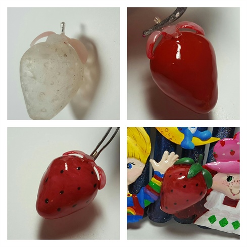 The berry that strawberry is holding was formed with play doh covered in hard gel.  Once I shaped and smoothed it out the color and details were done using gel polish and then covered in wipe free top coat. 