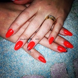 Coral Nails With Charm Accent