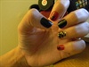 black/red/gold nails