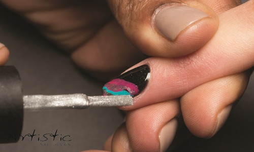 Using contrasting colors, apply 3 or 4 color stripes diagonally across the nail. Colors used in Step 4 are Avante-Garde #01, V.I. Pink Room #86, and Trouble #99.
