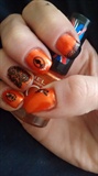 Orange and Black Lace Cameo Nails