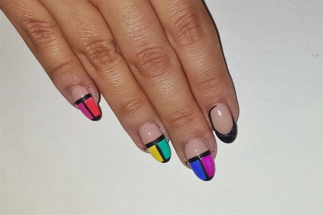 Using black gel polish or acrylic paint and paint lines above and below the colored squares, then divide the colors with a black line. 