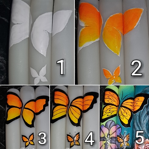 BUTTERFLIES:I have colored them yellow and orange, blended in between to get the ombre effect, lined them black and added tiny black lines over.