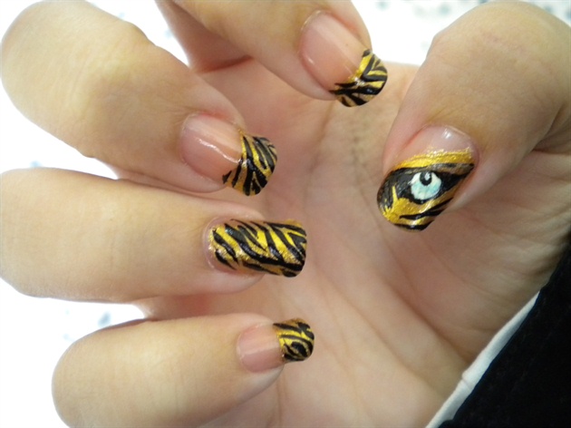 1. Tiger Nail Art Designs: 10 Ideas for Your Next Manicure - wide 7
