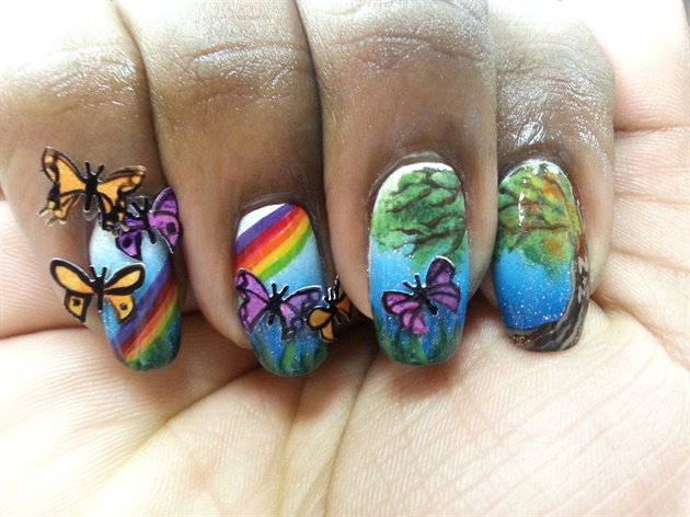 Spring offers plenty of Mariah as well. Nick and Mariah's initials are carved in the tree, her Rainbow detail adds fun and more color, and finally I wanted the polish butterflies to dance off the nails!