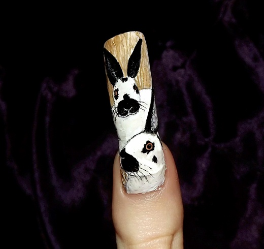 Checkered Giant rabbit nail art..