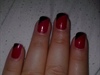 red nail with black tip