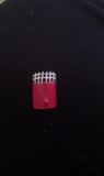 red nail with black and white tip