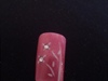 pink nail with flowers