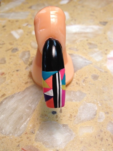 Add black and white pin stripes to middle section of nail.