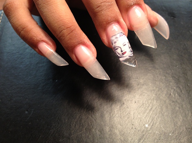 Complete acrylic on nails Add picture on to nails with glue, embed file and shape.
