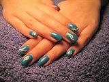 Teal Nails With White Nail Art