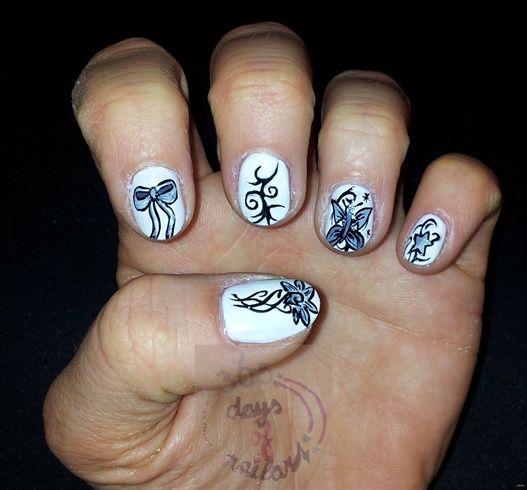 Nail art with tattoo designs
