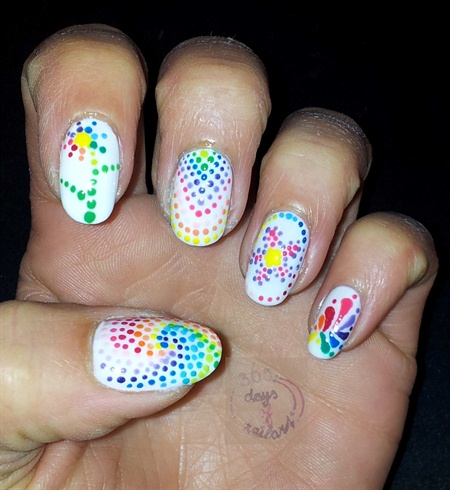 Rainbow dotted nails