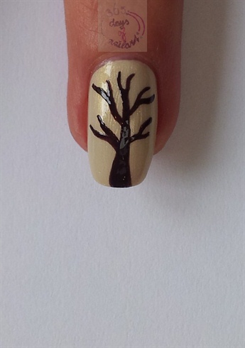 Step 2: Paint a tree with the striper brush and brown polish
