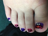 red and purple elmo toes