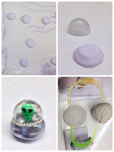 1.) I build a few rocks for added detail with acrylic. 1.) I build a spaceship with acrylic for the base and a gel dome for the roof. The roof was made by applying gel over clay curing and then removing the clay. 3.) I begin adding details to the spaceship, I add an alien made of acrylic and some caviar beads on top of gel then cure them into place. 4.) I build Saturn out of clay, coat it with gel and cure it. I create the rings out of glass gel and outline them with acrylic paint
