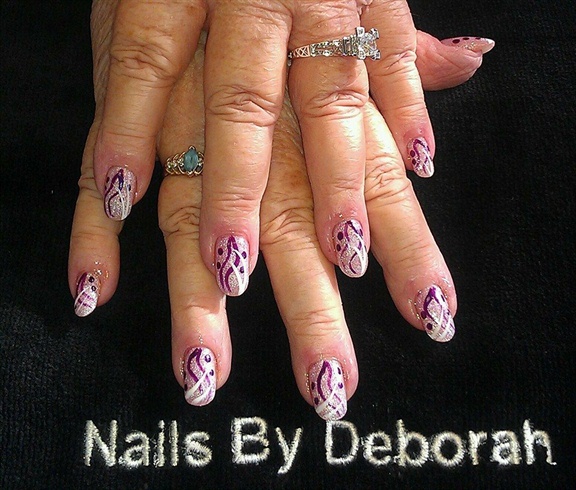 pink acrylic with purple &amp; white designs