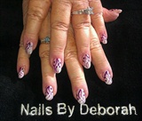 pink acrylic with purple &amp; white designs