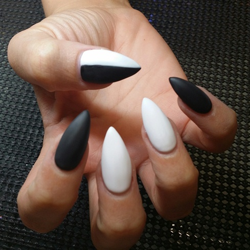 After the nails were filled and prepped for polishing, I chose to paint them with white and black gel polish, and topped with a matte gel top coat.  I chose the matte finish for my base colors because I thought it would be an easier finish to paint on.
