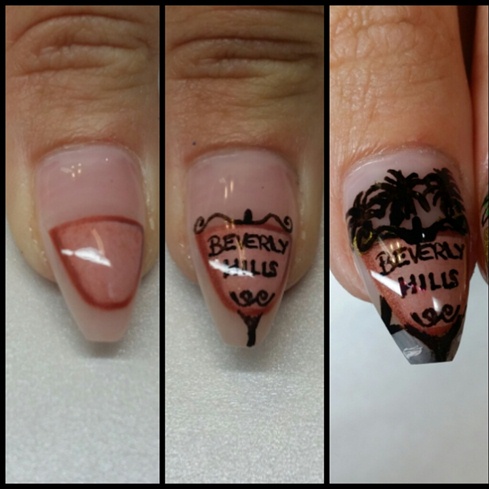 For my second thumb nail I chose to show a Beverly Hills road sign.  Including another landmark LA.  To create it I used gel polish to make a tan base, I cured it and then outlined it in a bronze gel polish. When that was also cured I wiped the dispersion layer and added wording and fine details with a tiny brush and acrylic paint.