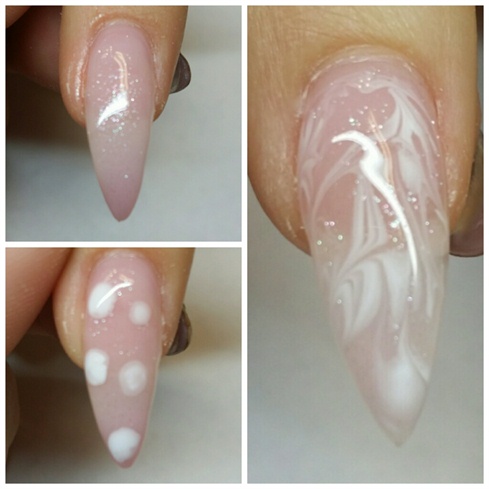 STEP 3: On four of my nails I used this feathery marbelizing technique.  I first applied a coat of a transparent gel polish with fine silver sparkles.  With out curing it, I dropped in a few dots of white gel polish. I Then used my detail brush to create movement on the nail, feathering the two tones together.  When I felt like I had the effect I wanted I cured it all for two minutes (uv).