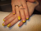 yellow French manicure with daisy flower