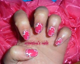 Simple flowers on hot pink nails