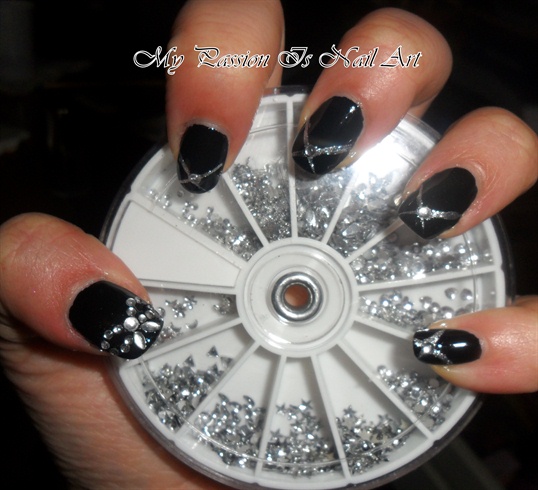 glitter bow on black nails