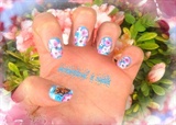 butterfly on spring flowered nails