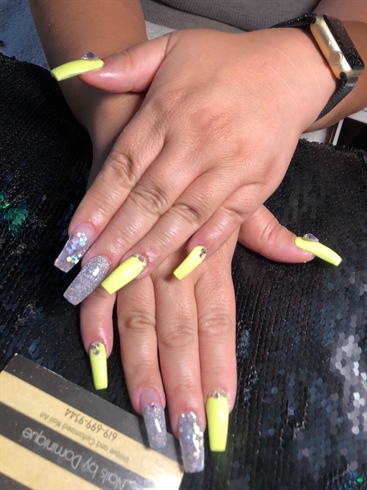 Neon yellow with silver and bling coffin nails