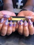 Encapsulated  nude and purple nails