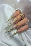 Gold Stiletto sculpted gel nails with Nail Perfect Foil Design gel 