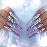 Aurora pigment and Swarovski crystals sculpted gel stiletto nails 