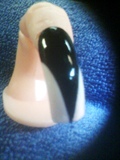 Pointed black &amp; white nail