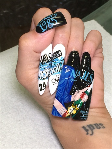 Finally I finish the thumb with black base, turquoise writing with the month and year of the magazine cover. I also finish it with IBD gel top coat and cure. To finalize, I swipe with nail cleanser to remove the last tacky layer. Then I applied pre-made tip to the nails for the final picture. 