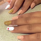 Polish and nail art with gold glitter 