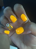 Bright Yellow/Orange Nails With Design 