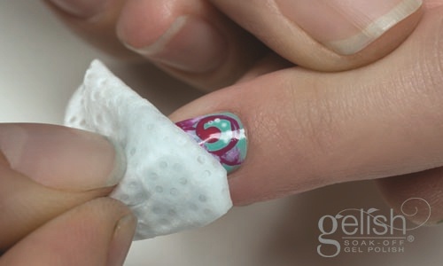 Apply Gelish® Nail Surface Cleanse to a lint-free nail wipe and remove tacky residue from nails. 